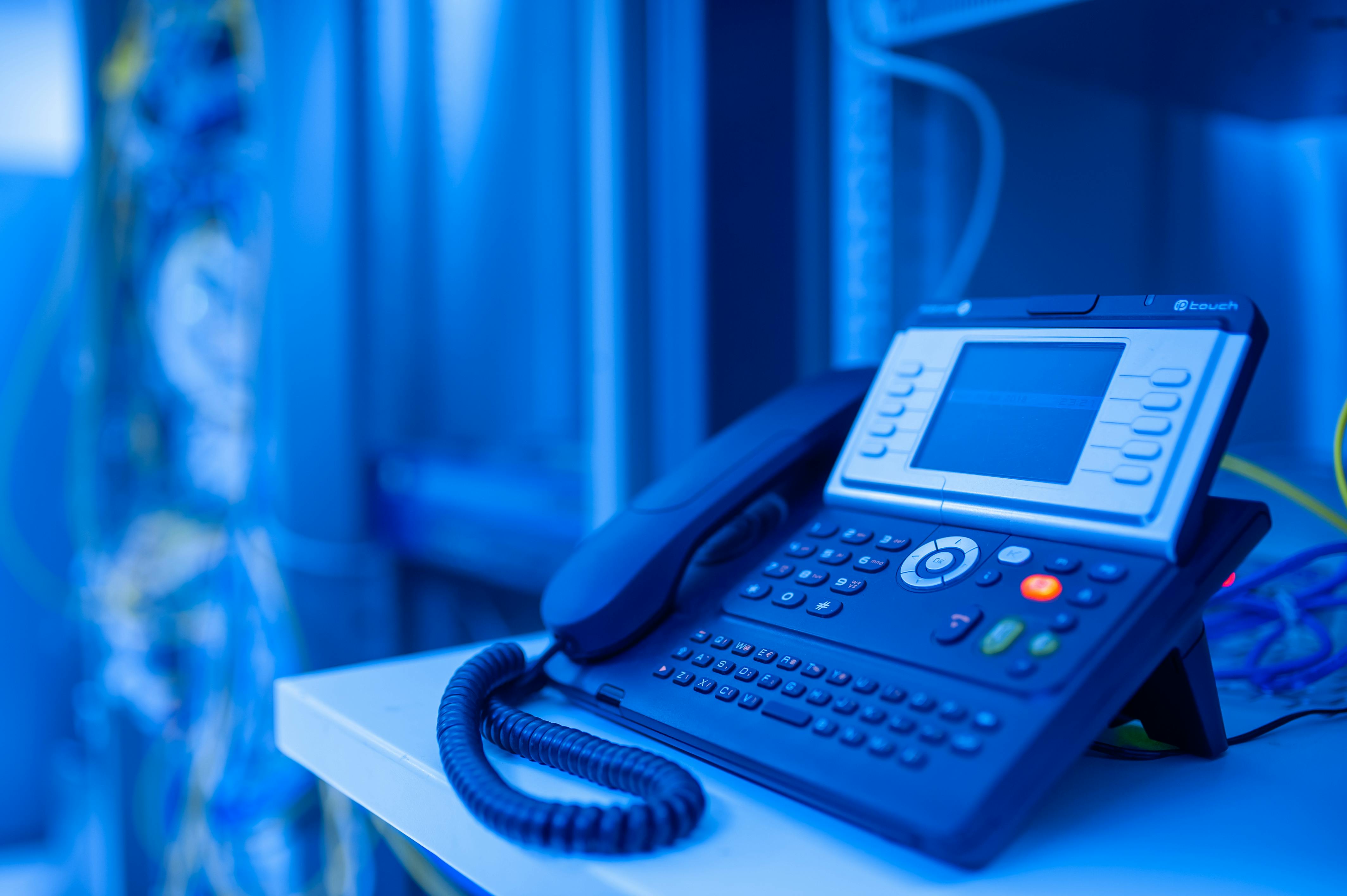 Yealink desk phones used in a business PBX and telephony environment in Dubai